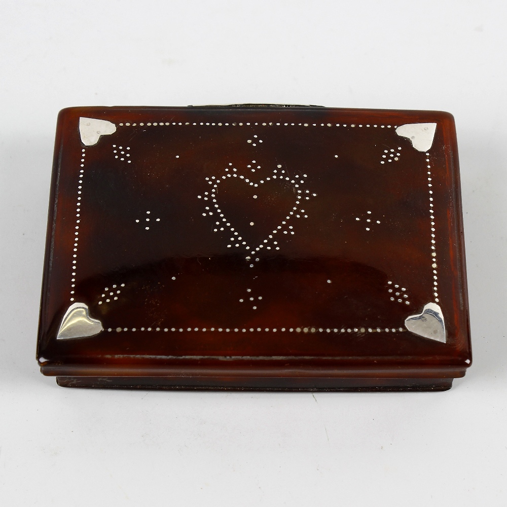 A tortoiseshell and piquework love token box. Of rectangular form with central dotted heart, with