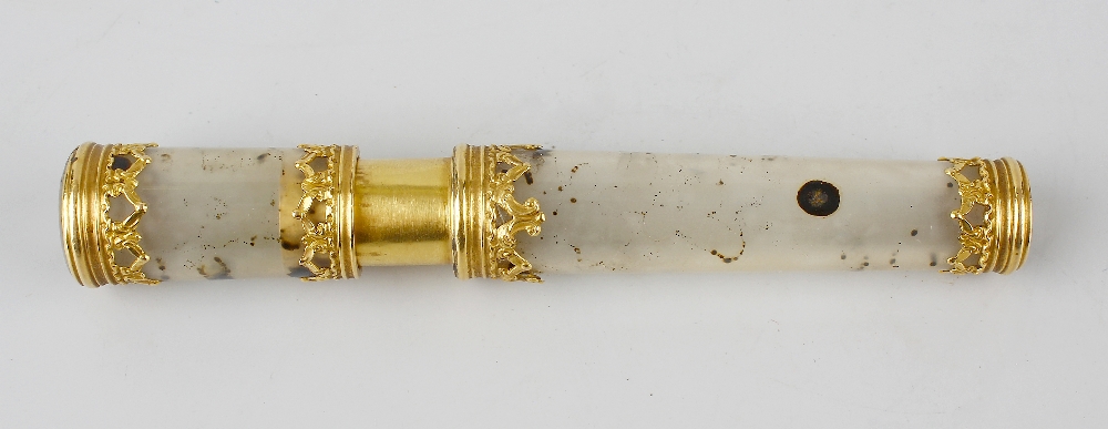 A Palais-Royal style moss-agate bodkin case, of cylindrical form having ogee pierced gilt mounts,