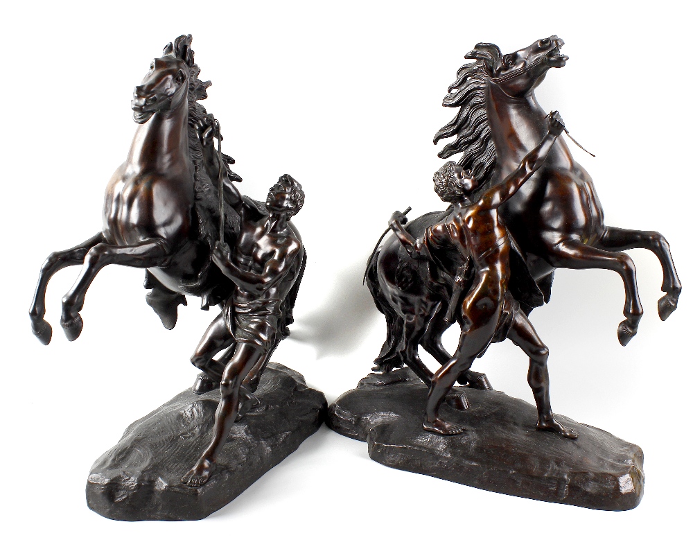 A pair of 19th century bronze Marly horses In the manner of Coustou, each rearing horse with