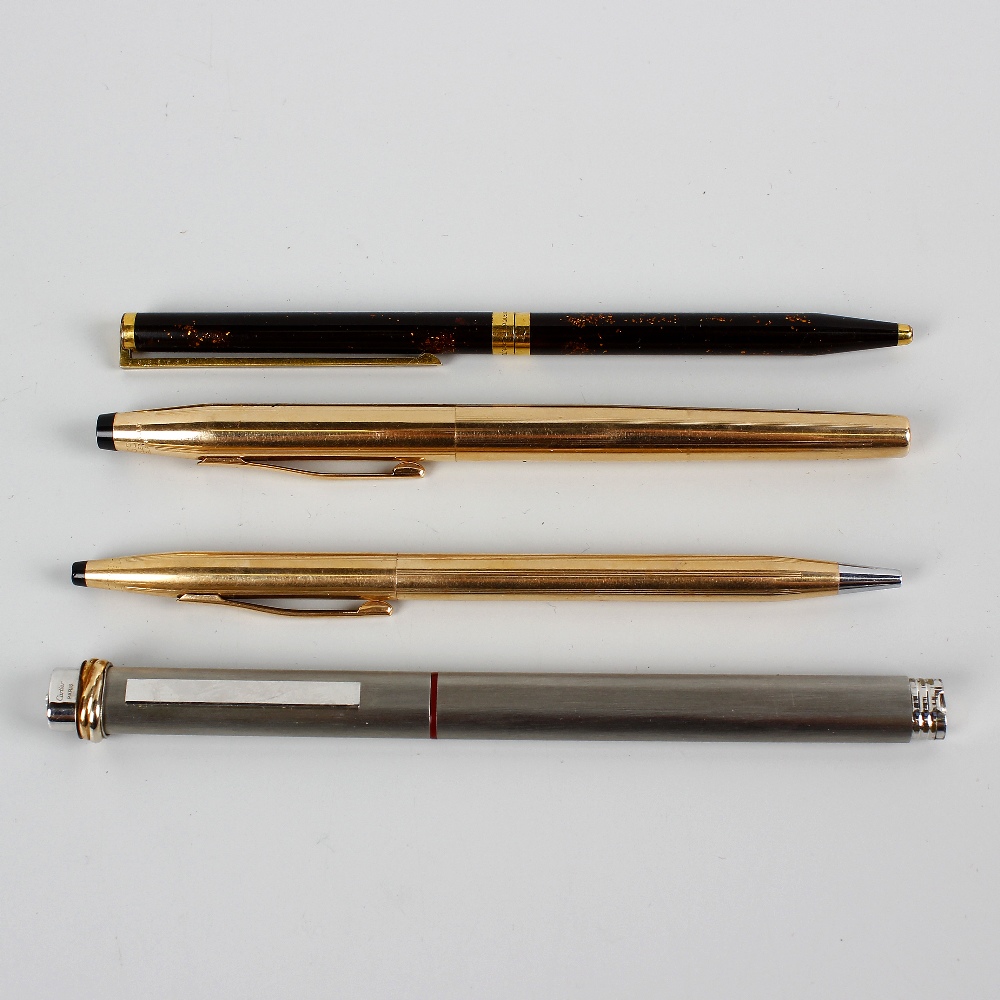 A selection of various pens, to include a Cartier brushed steel rollerball, a Dupont gold plated