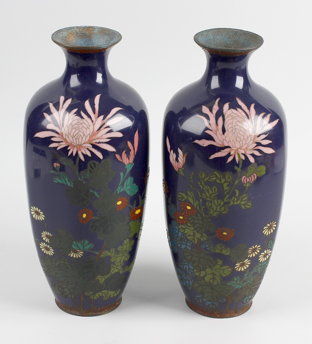 A large pair of cloisonne vases. Of hexagonal sided ovoid form having waisted neck, decorated with