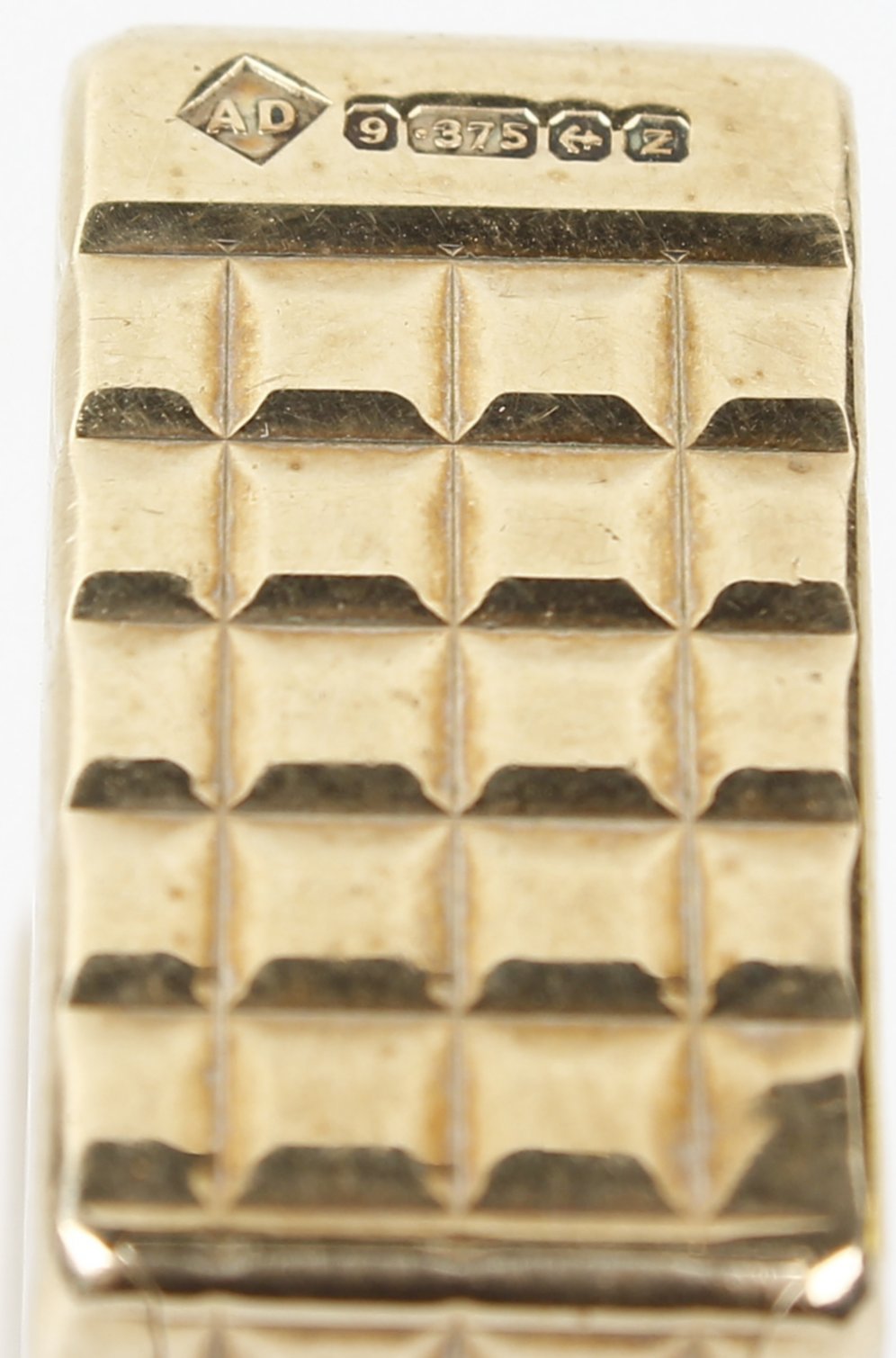 A Dunhill 9ct gold lighter. Of rectangular form having chequered texture to the whole, hallmarked - Image 2 of 2