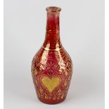 A 19th century gilt red glass bottle. Possibly 19th century, Ottoman Turkish, of Beykoz style having