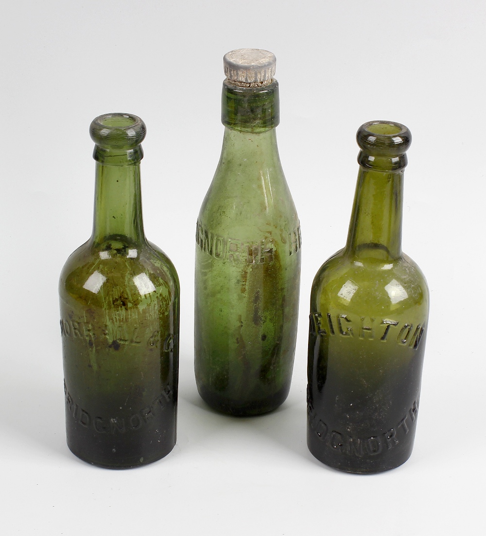 Two boxes containing a large collection of assorted glass bottles Shropshire interest, to include