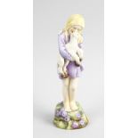 A Worcester figure, 'Spring' 3012 Modelled by F G Doughty. Modelled as a young girl holding a