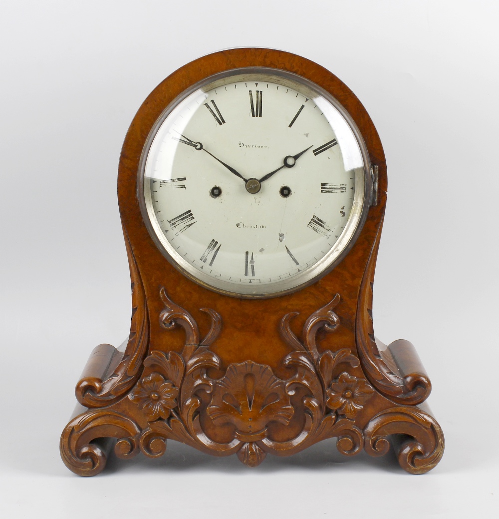 A Victorian carved walnut twin fusee bracket clock The 7.5-inch cream-painted convex Roman dial