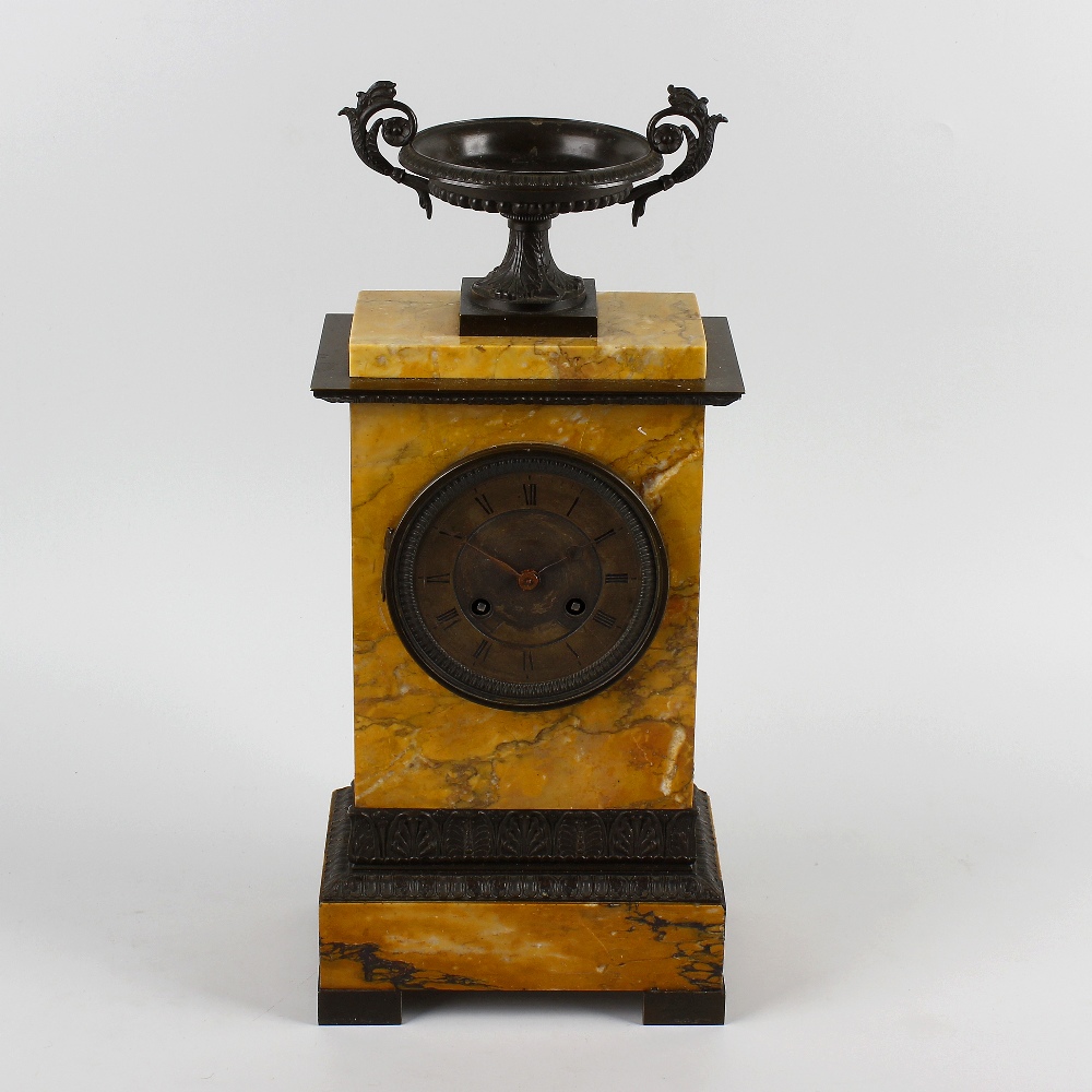 An early to mid 19th century French bronze and sienna marble mantel clock.Pons, Paris.The 3.75-