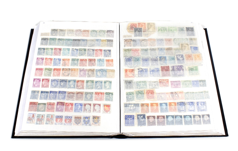 A large mixed album of stamps. To include early 20th century and Victorian examples, plus German,