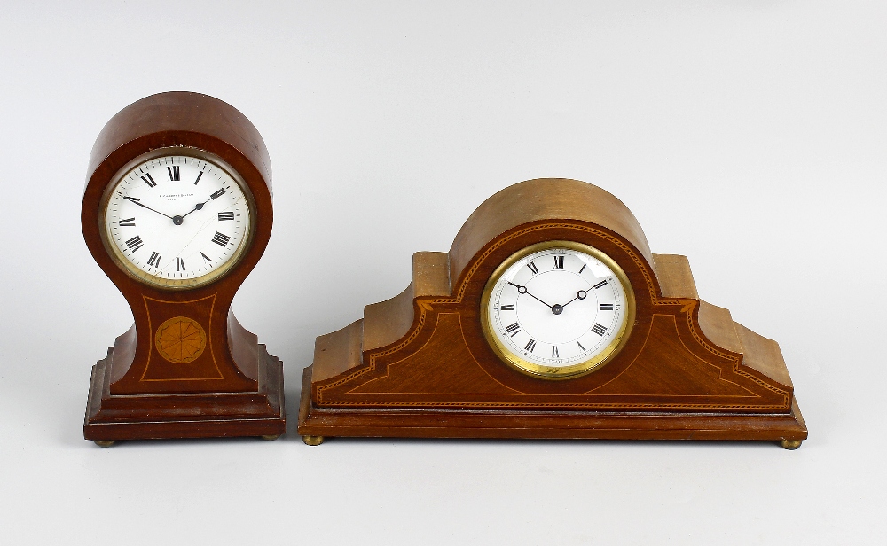Two early 20th century inlaid mahogany mantel clocks The first of balloon form, retailed by
