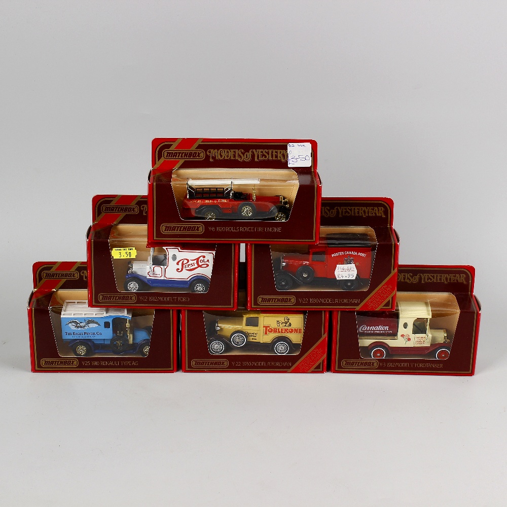 A box containing 50 Matchbox Models of Yesteryear diecast model cars and other vehicles, each in