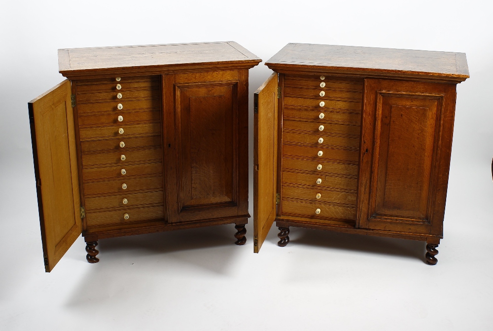 A fine pair of oak specimen cabinets. The plain rectangular top over twin doors, opening to reveal - Image 3 of 3