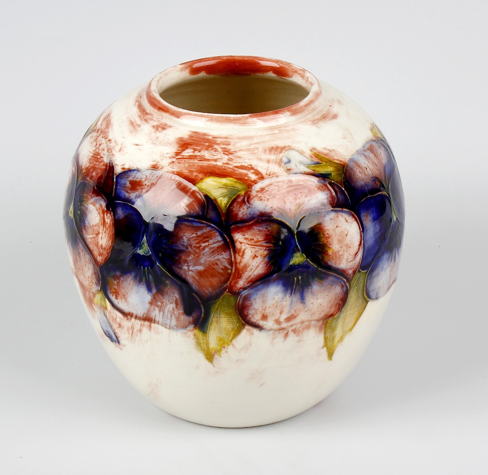 An unusual Walter Moorcroft 'Pansy' pattern vase Circa 1950, of ovoid form, with tube-lined