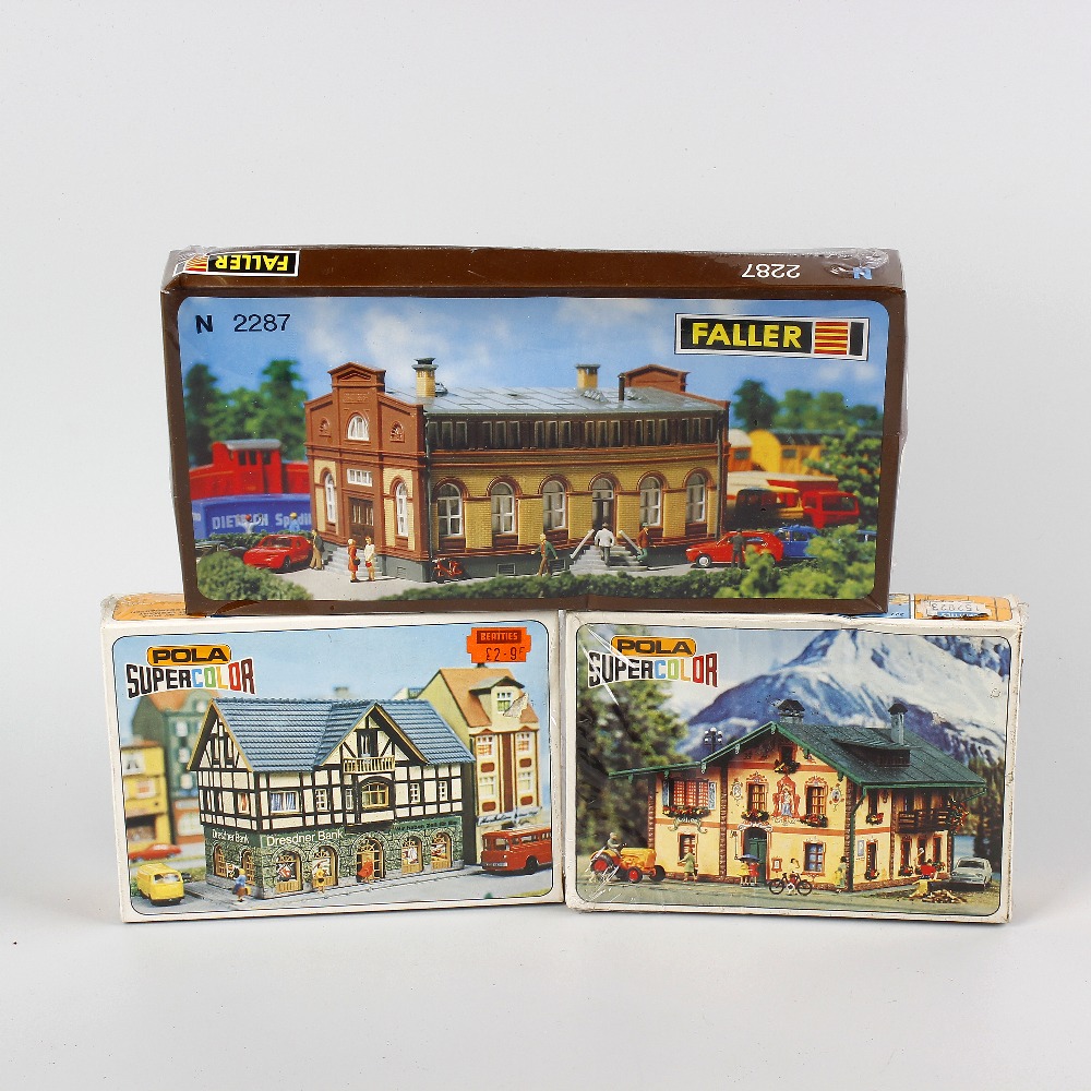 Two boxes containing a good mixed selection of Faller and other N gauge model railway plastic