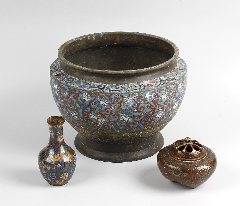 Three items of cloisonne. Comprising a jardiniere, a small bud vase and an incense burner and