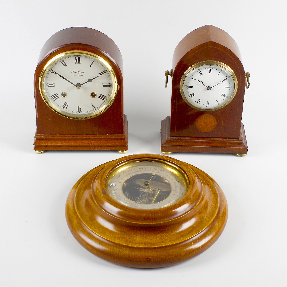 An early 20th century mantel clock and aneroid barometer, the inlaid mahogany clock of lancet arch