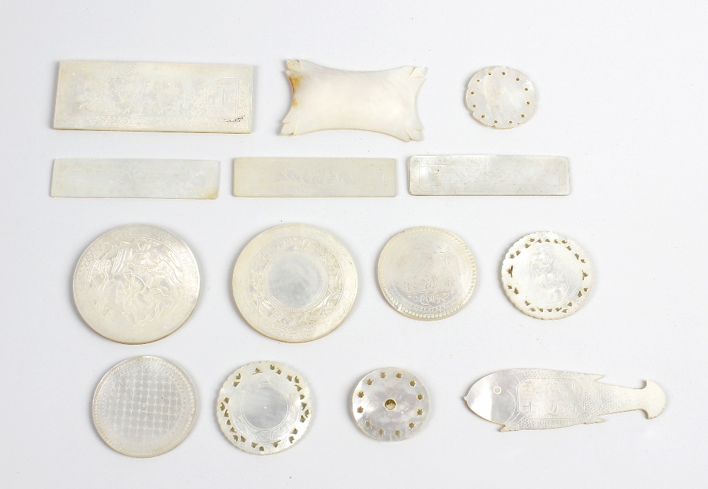 A small collection of 19th century Chinese mother-of-pearl gaming counters To include two large