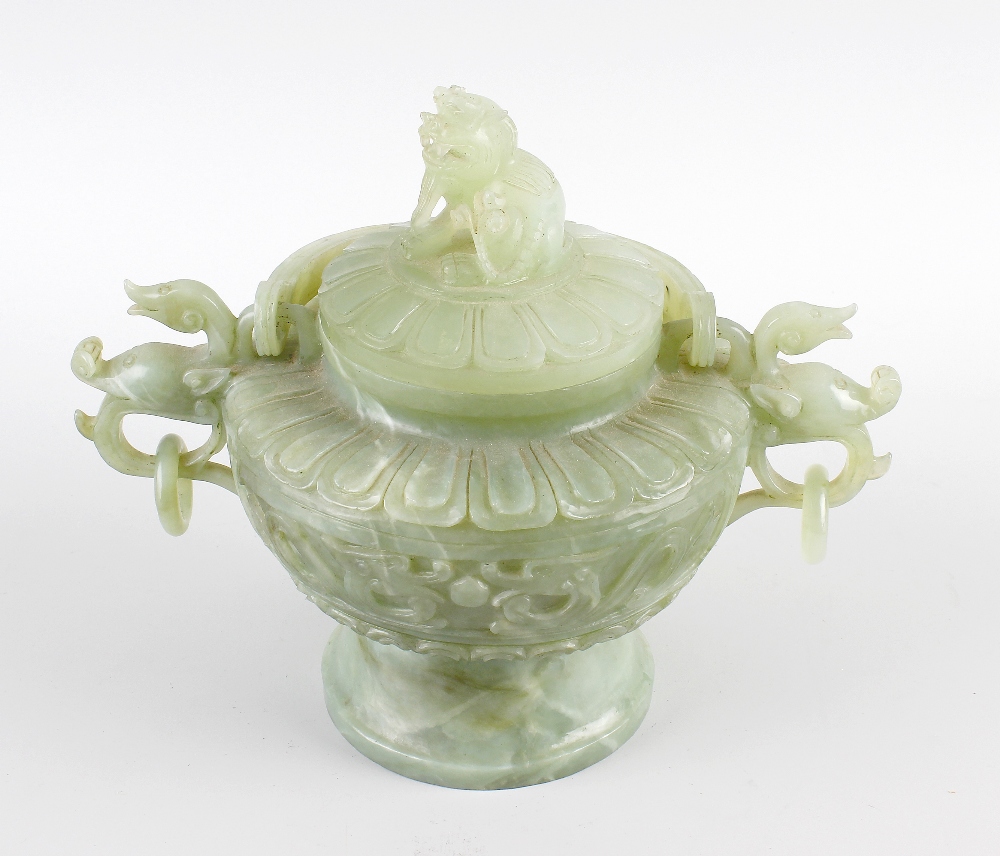 A Chinese carved green hard stone bowl and cover, the body carved with dual dragon and pearl
