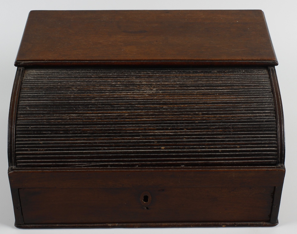 An early 19th century mahogany tambour-front writing box. In the form of a miniature bureau top with - Image 2 of 2