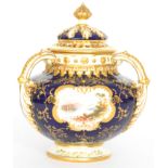 A 19th Century Coalport tri-handled vase