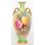 A Royal Worcester twin handled vase, the