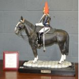 A large Connoisseur of Malvern porcelain horse and rider figurine entitled Sefton, modelled as the