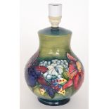 A Moorcroft Pottery lamp base decorated