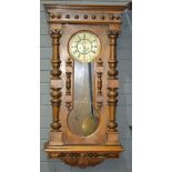 A 19th Century walnut cased wall clock b