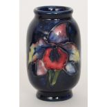 A miniature Moorcroft vase of barrel for