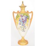 A Royal Worcester twin handled vase and