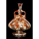 A late 19th Century twin handled vase, i