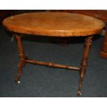 A Victorian walnut oval centre table, ra