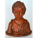 A 19th Century plaster bust of a young b