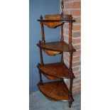 A Victorian walnut four-tier corner what