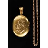 A Victorian oval pendant photograph lock