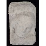 A small late 19th Century carved stone h