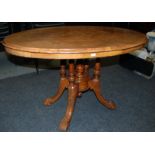 A Victorian walnut oval centre table, ra