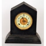 A late Victorian mantel clock of apex fo