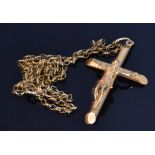 A 9ct hallmarked crucifix suspended from