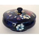 A Moorcroft Frilled Orchid pattern powde