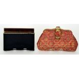 A ladies metal evening purse or compact,