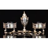 A hallmarked silver three piece cruet se