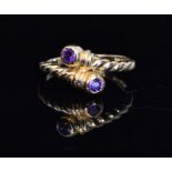 A 9ct Roman style amethyst two stone rin