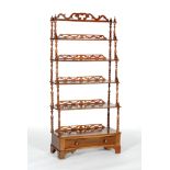 A Victorian mahogany six-tier 'waterfall