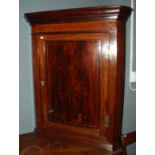 A George III line inlaid mahogany hangin