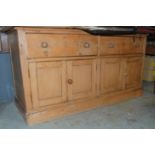 A 19th Century waxed pine two drawer dre