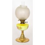 A Victorian brass oil lamp painted yello