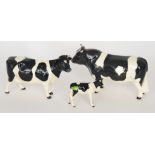 A Beswick Friesian family comprising a C