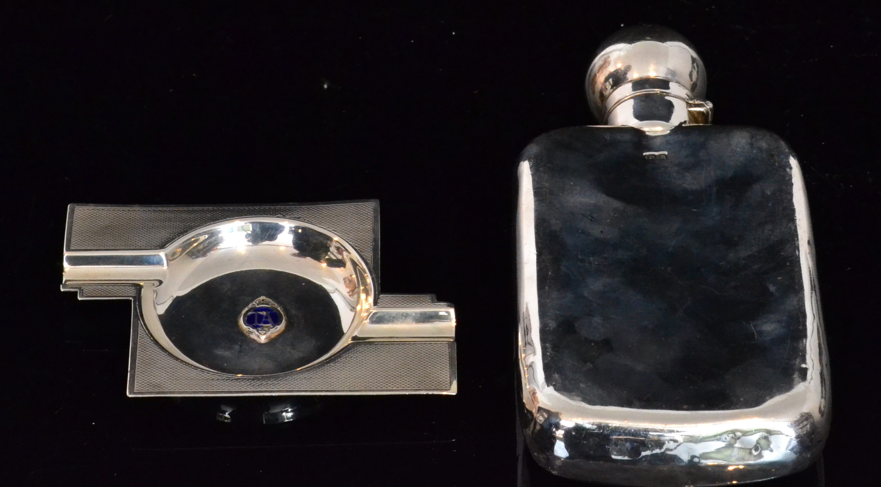 A hallmarked silver hip flask, of plain