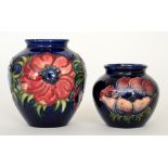 Two Moorcroft Anemone pattern vases each