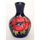A small Moorcroft vase of globe and shaf
